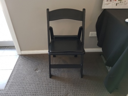 black_folding_chair
